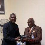 MD of New Horizons hands over drone.